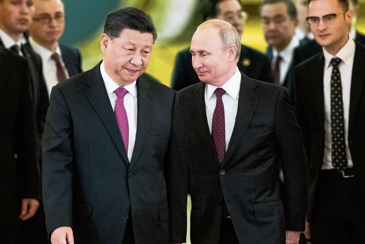 De Chinese president Xi Jinping (links) en de Russische president Vladimir Poetin komen bijeen voor gesprekken in het Kremlin in Moskou in juni 2019.