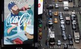 Billboard bij <strong>Times Square</strong> (New York). Coca-Cola kondigde aan dit jaar geen nieuwe prijsverhogingen door te voeren in Europa en de VS.